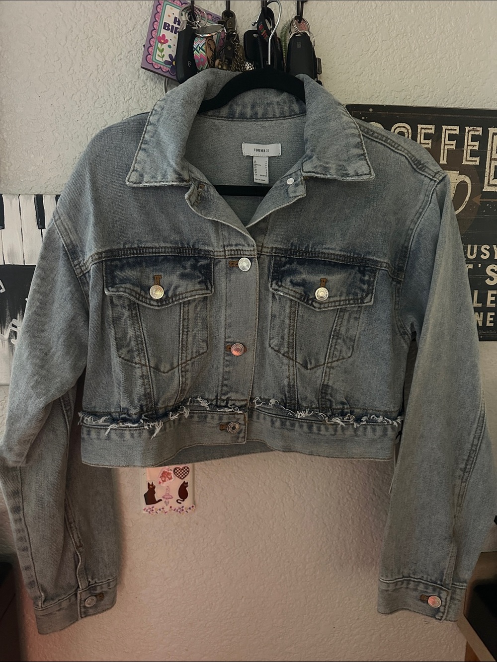 Forever 21 Light Wash Cropped Denim Jacket with Distressed Hem